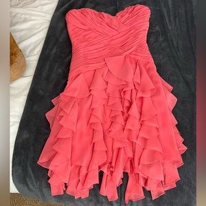 Never worn coral cocktail dress new with tags. Purchased on sale for $117